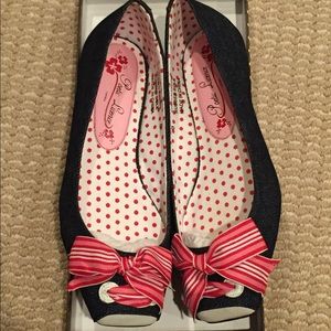 Denim flat with red and white bow